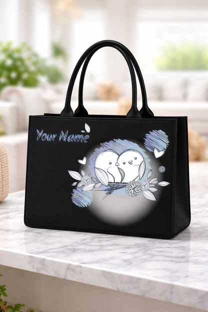 STYLLURE Customised Adorable White Lovebirds illustration with Delicate Floral Accents on Black Canvas Tote Bag with Name Print, Premium Handbag for Women, 16x12x5 inches, Fits 15.6 inch Laptop