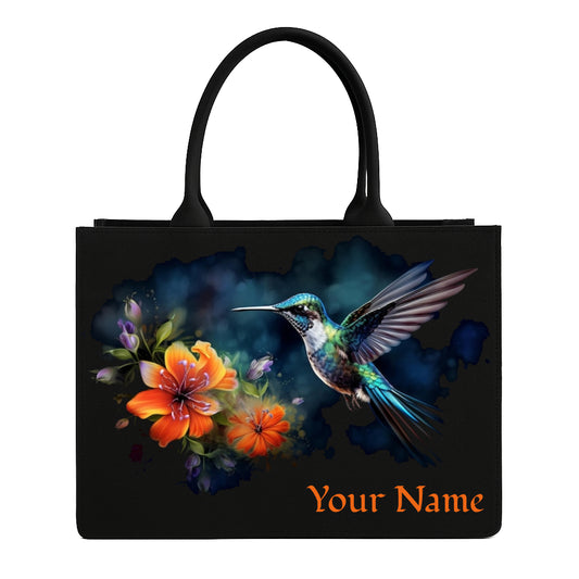 STYLLURE Personalised Tote Bag with Flying Hummingbird and Floral Design, Black Canvas, 16x12x5 Inche, Fits 15.6 Inch Laptop, Customisable Name Print, Premium Handbag for Women